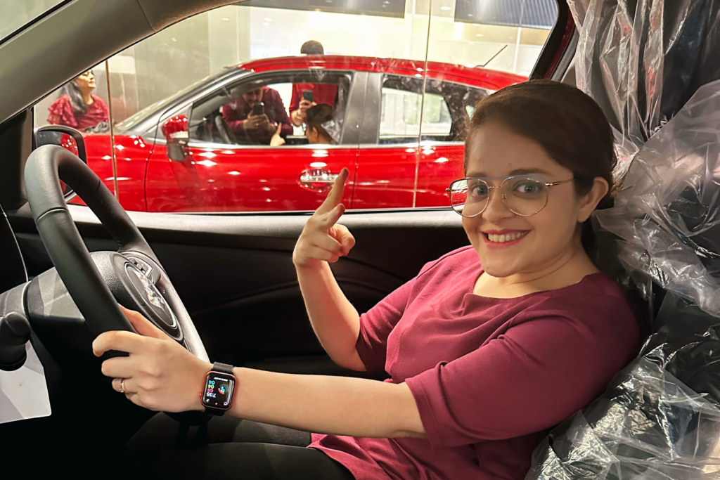 Financially independent woman driving car